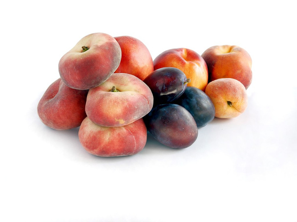 sweet fruits plums and peaches - Φωτογραφία, εικόνα