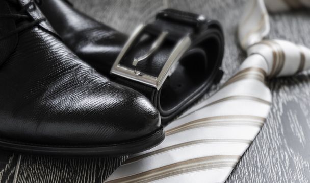 black leather boot strap and tie - Fotoğraf, Görsel