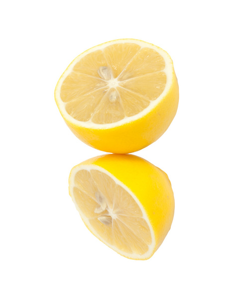 Two fresh lemon halves on white background. - Foto, Imagen