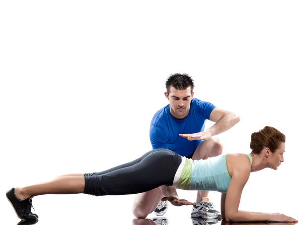 Man aerobic trainer positioning woman Workout - Fotoğraf, Görsel