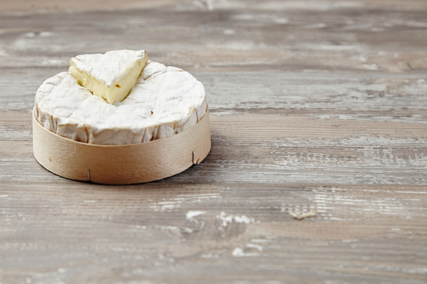 Camembert in wooden box - Photo, image
