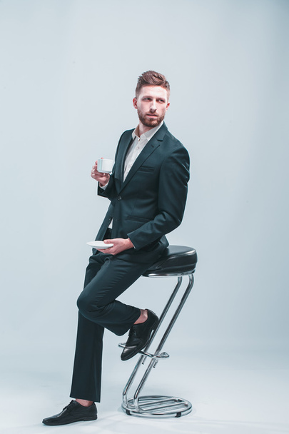 Portrait of handsome stylish man in elegant suit - Foto, imagen