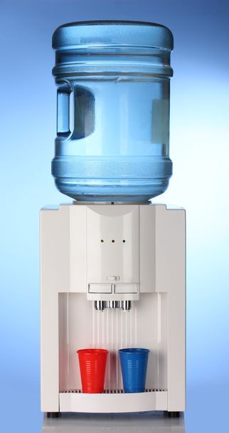 Electric water cooler on blue background - Foto, immagini