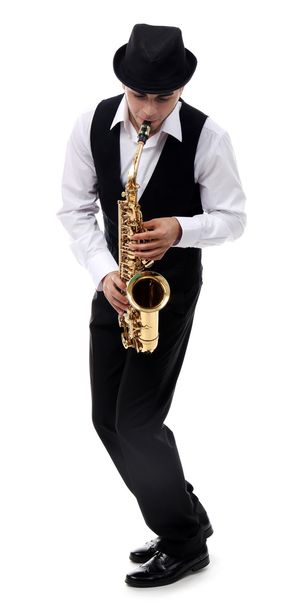 man playing on saxophone - Фото, изображение