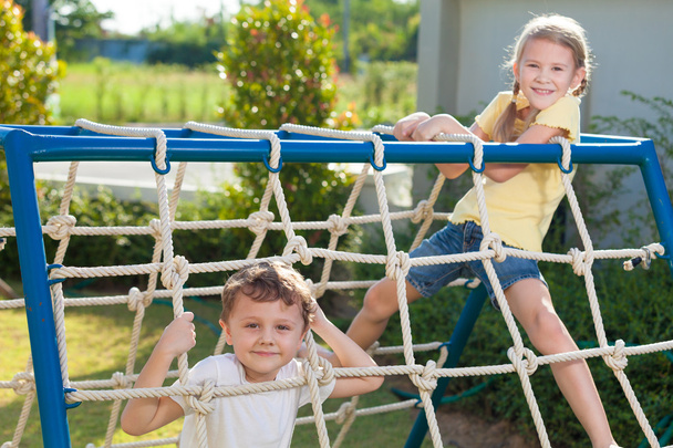happy children playing on the playground - Фото, зображення