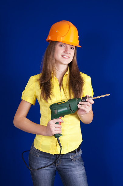 Construction worker with drill - Fotoğraf, Görsel