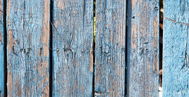 Nahaufnahme von grauen Zaunplatten aus Holz - Foto, Bild