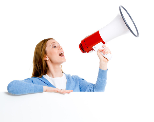 attractive young woman with blank ad banner and megaphone - Photo, image