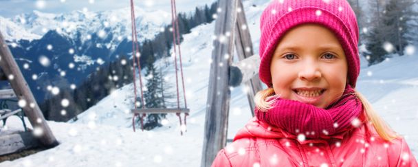 happy beautiful little girl over winter background - Photo, Image