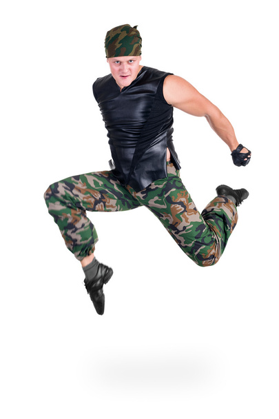 dancer dressed soldier jumping - Φωτογραφία, εικόνα