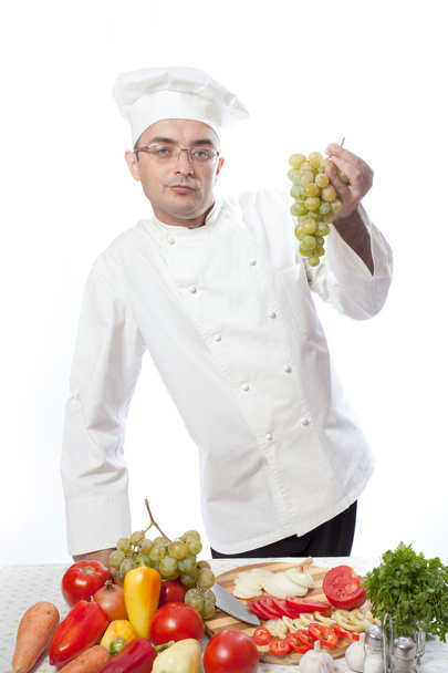 Jefe cocinero y uva blanca
 - Foto, Imagen