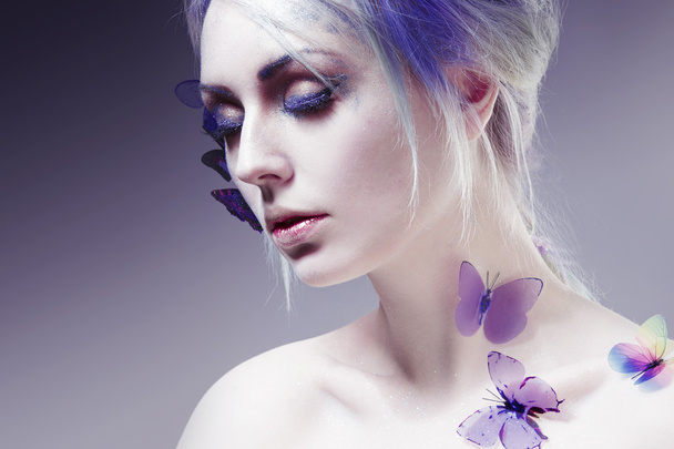 Beautiful Girl With  Butterfly. Beauty Face. Creative Make up and Hair Style. portrait with toning - Фото, зображення
