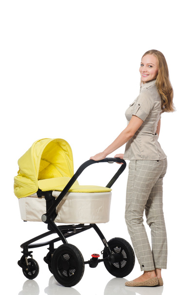 Kobieta z dzieckiem i wózek izolowane na białym - Zdjęcie, obraz