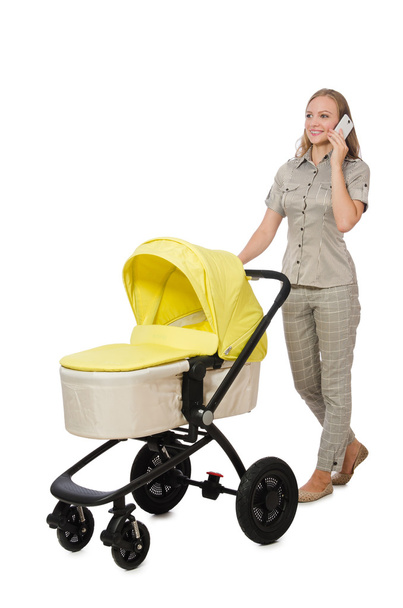 Vrouw met baby en kinderwagen geïsoleerd op wit - Foto, afbeelding