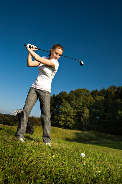 Giocare a golf
 - Foto, immagini