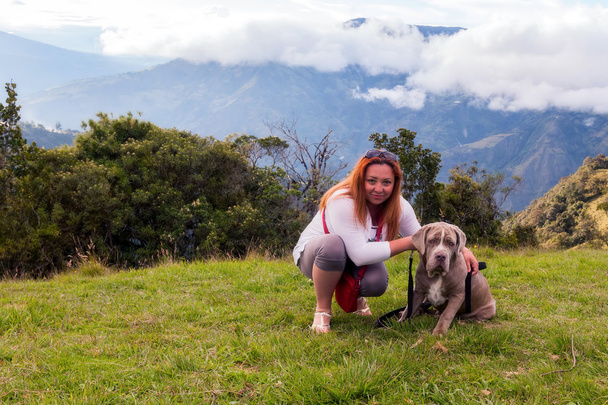 Beautiful Blonde With Her Dog - Foto, Imagen