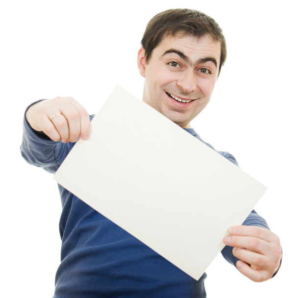 Smiling business man displaying blank card. - Foto, afbeelding
