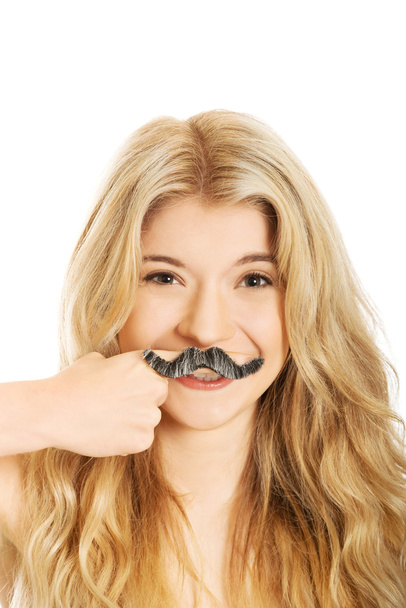 Blonde student with mustache looking at camera - Фото, зображення