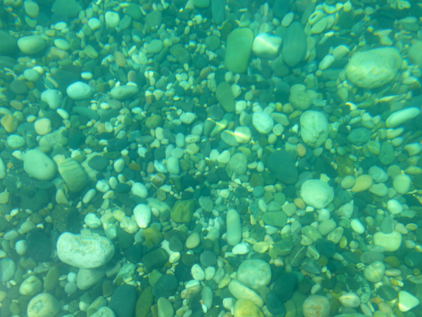 Texture of stones in sea - Photo, Image