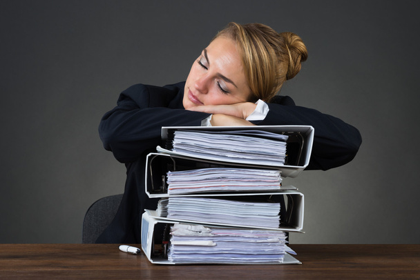 Businesswoman Sleeping On Stacked Binders - Photo, Image