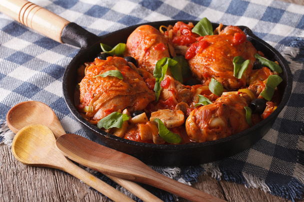Italian cuisine: Chicken Cacciatori close up in a pan. Horizonta - Fotó, kép