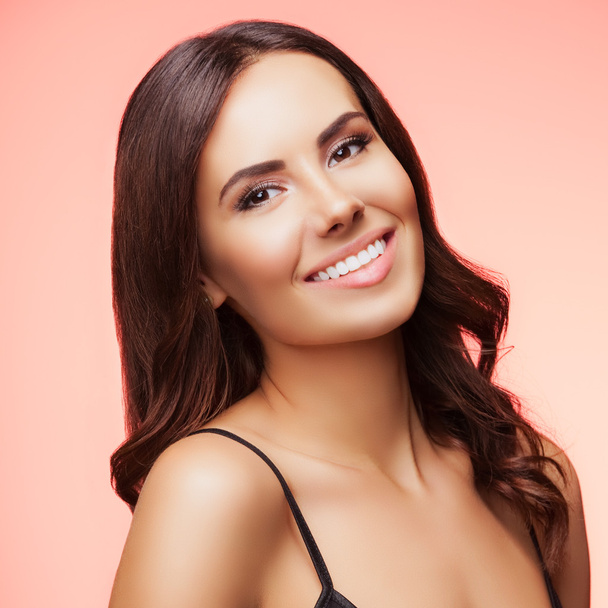 smiling young woman, on rose - Photo, image