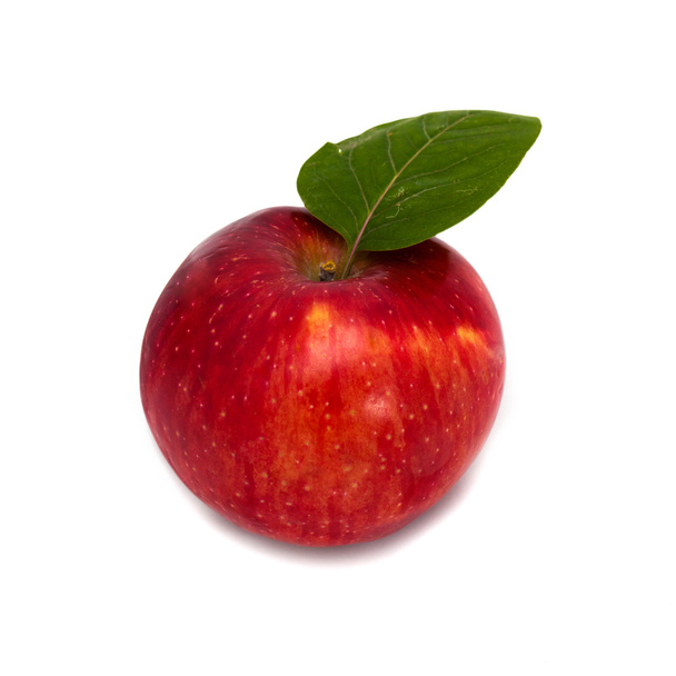 Κόκκινο μήλο με ένα φύλλο σε λευκό φόντο - Φωτογραφία, εικόνα