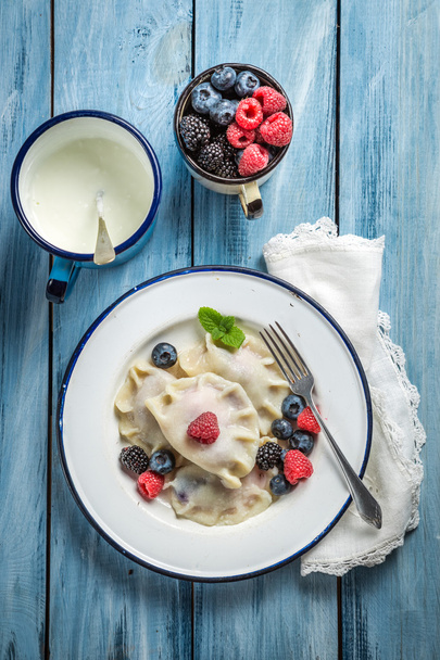 Delicious dumplings with fresh fruits - Photo, Image