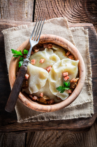 Yummy dumplings with wild mushrroms and onion - Фото, изображение