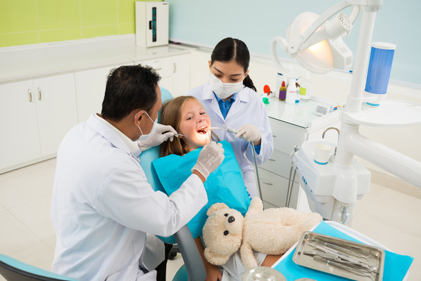 Girl having dental caries treatment - Photo, Image