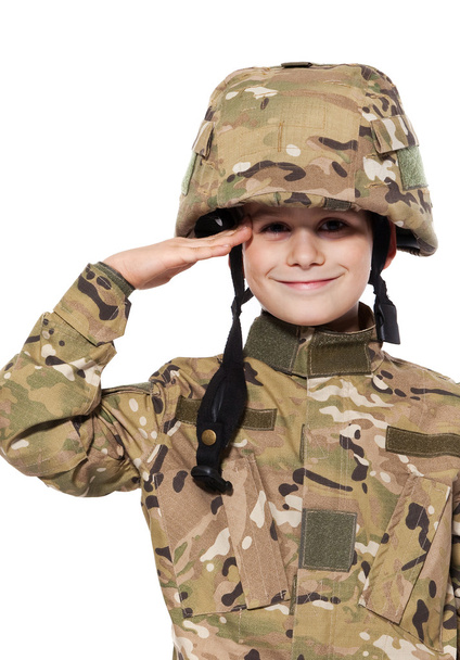 Saluting soldier. Young boy - Zdjęcie, obraz