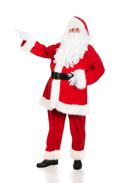 Santa Claus in het wijzende gebaar - Foto, afbeelding