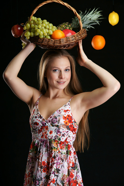 The beautiful girl with fruit - Фото, зображення