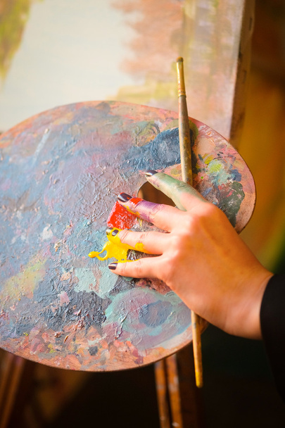 Artist's hand with the brushes - Photo, Image