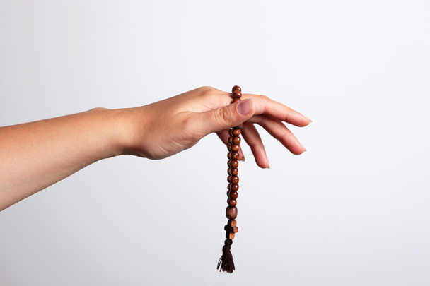 A hand and rosary - Valokuva, kuva