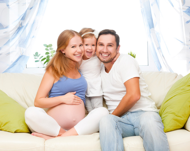 happy family. pregnant mother, father, and child daughter at hom - Φωτογραφία, εικόνα