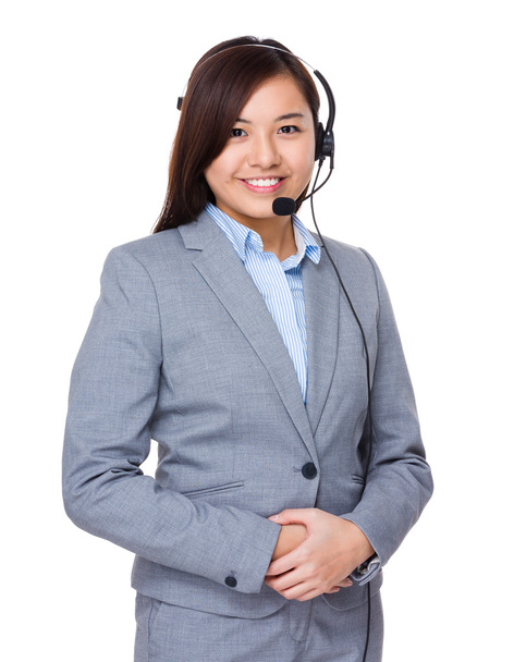 Representante de servicios al cliente con auriculares
 - Foto, imagen