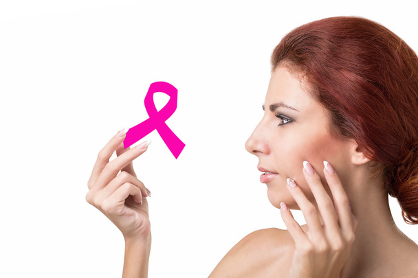 Kobieta z różową wstążką symbol zdrowia kobiet - Zdjęcie, obraz