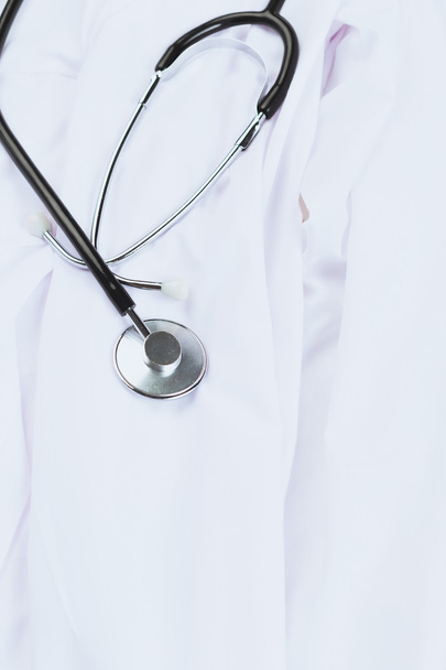 Stethoscope with doctor coat - Foto, afbeelding