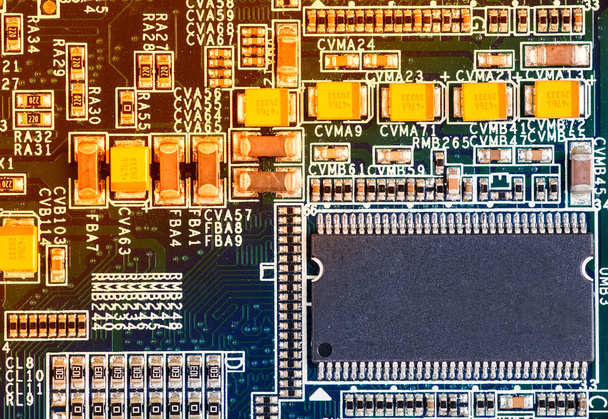 Printed computer motherboard with microcircuit, close up - Фото, зображення