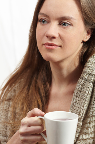 Woman with cup of tea - Fotoğraf, Görsel