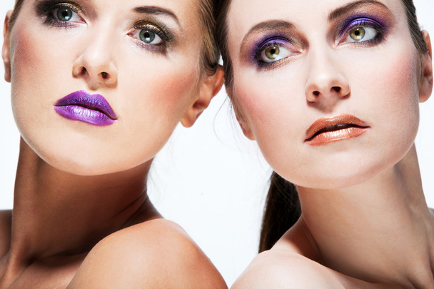 Beautiful fashion models with full make up. - 写真・画像