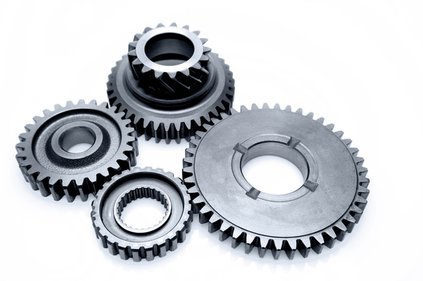 Closeup of steel gears meshing together - Fotografie, Obrázek
