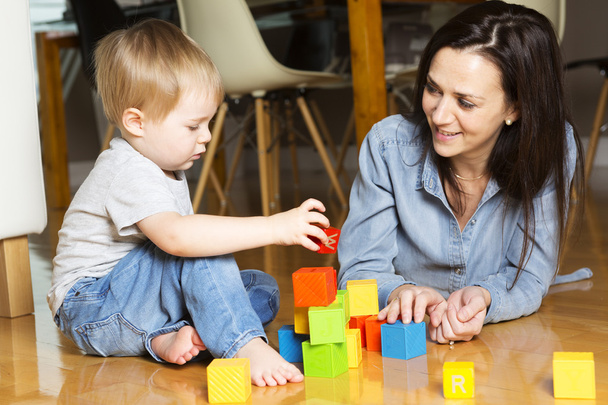 mother play block with his son at home - Foto, imagen