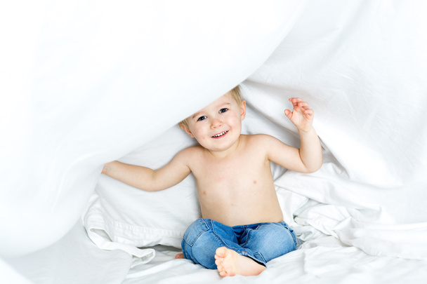 Healthy Lifestyle of young little children boy on bed - Фото, зображення