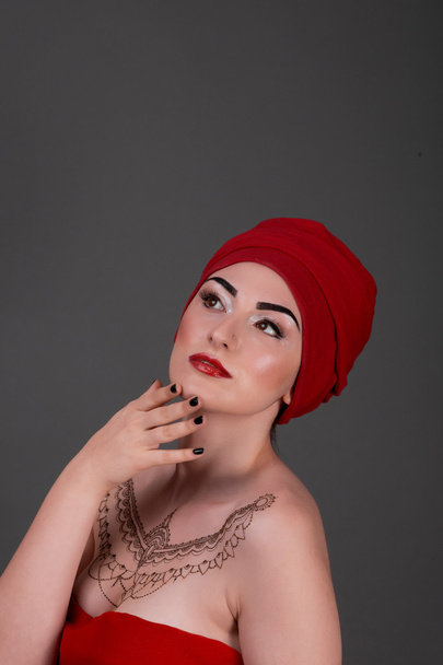 the very pretty woman with red neckerchief, sensual sexuality ga - Foto, imagen