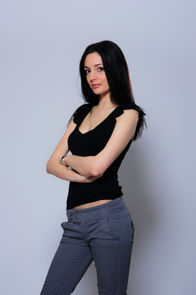Young woman in jeans and t shirt - Photo, Image