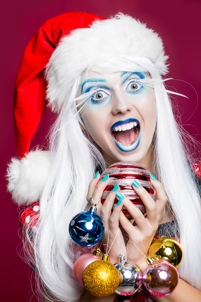 Woman with christmas balls - Photo, Image