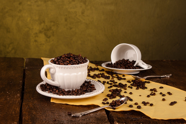 Une tasse de grains de café
 - Photo, image