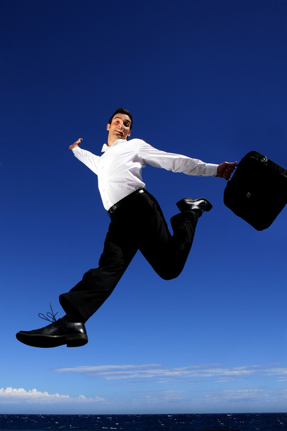 Empresário saltando pelo ar
 - Foto, Imagem